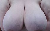 Divine Breasts Nicole Busty BBW On Back
