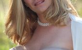 Divine Breasts 405689 Blond Preggo With Large Breasts
