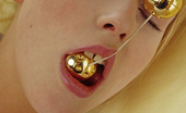 Magic Erotica 414957 Blonde Teen Toys Her Kitty With Two Big Golden Balls And A Glass Of Oil
