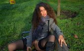 Magic Erotica 415047 Shaved Brunette Showing Pussy In A Park
