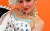 Pin-Up Wow 417786 Saucy Blonde Showgirl In Corset And White Fishnet Stockings Knows How To Tease.
