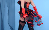 Pin-Up Wow 417825 Sexy Blonde Dominatrix Strips From High Boots, Corset And Stockings.
