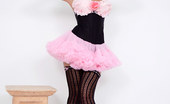 Pin-Up Wow Elle Richie In Her Tiny Pink Skirt And Black Corset Makes A Strip Only For You!
