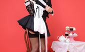 Pin-Up Wow 417945 Cute Blonde Waitress Shows Off Her Black Seamed Stockings.

