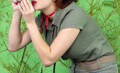 Pin-Up Wow 417958 Busty Redhead Loses Her Clothes In Jungle
