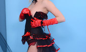 Pin-Up Wow 417970 Sexy Blonde Dominatrix Strips From High Boots, Corset And Stockings.
