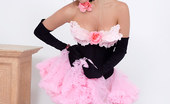 Pin-Up Wow 417979 Elle Richie In Her Tiny Pink Skirt And Black Corset Makes A Strip Only For You!
