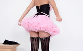 Pin-Up Wow 417979 Elle Richie In Her Tiny Pink Skirt And Black Corset Makes A Strip Only For You!
