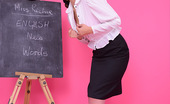 Pin-Up Wow 418001 Strict Teacher Elle Richie In Black Stocking Stripteases To Get A Students Attention.
