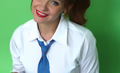Pin-Up Wow 418036 Cute Brunette College Girl Elle Richie Stripteases With Lollipop.
