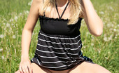 Pee Hunters 418513 Super-Beautiful Blond Girl Piddling On A Meadow
