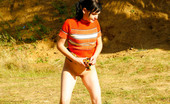 Pee Hunters 418578 Cute Tart Walking Down The Hill Squats Down To Pee
