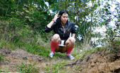 Pee Hunters 418591 Naughty Brunette Pisses Into A Sandpit In Forest
