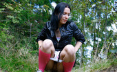 Pee Hunters 418591 Naughty Brunette Pisses Into A Sandpit In Forest
