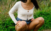 Pee Hunters 418621 Cute Brunette Babe Pisses Up A Storm In The Field
