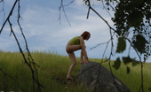 Pee Hunters 418699 Girlie Takes A Leak Sitting On Top Of A Huge Rock
