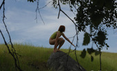 Pee Hunters 418699 Girlie Takes A Leak Sitting On Top Of A Huge Rock
