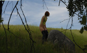 Pee Hunters 418699 Girlie Takes A Leak Sitting On Top Of A Huge Rock
