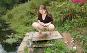 Pee Hunters 418787 Dirty Teen Slut Sits For A Piss On A Picnic Table
