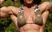 Muscularity Emery Miller 419325 Flexing Commando In This Sassy Little Army Green Outfit, Emery Poses And Flexes Up A Storm Rambo Style. She Shows Us Just How Long Her Tongue Is, And Ends Up Going Commando.
