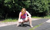 Hot Pissing 419676 Yummy Peeing Pussy Yummy Blonde Slut In A Mini Squatted On The Road For Bold Piddling