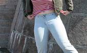 Hot Pissing 419693 Nasty Peeing Sexpot Big-Boobed Beauty In Jeans Squats And Voids Her Bladder In The Street
