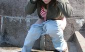 Hot Pissing 419693 Nasty Peeing Sexpot Big-Boobed Beauty In Jeans Squats And Voids Her Bladder In The Street
