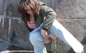 Hot Pissing 419693 Nasty Peeing Sexpot Big-Boobed Beauty In Jeans Squats And Voids Her Bladder In The Street
