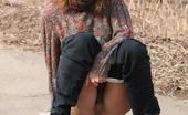 Hot Pissing 419731 Autumn Piss Puddle Sexy Daring Girl Stops In The Middle Of The Road To Empty Her Bladder
