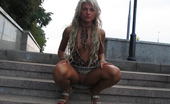 Hot Pissing 419739 Outdoor Stairs Piss Naked Blonde Beauty Makes A Puddle Of Pee Being Squatted On The Stairs
