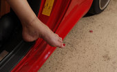 Foot Factory Codi Carmichael 421798 12-21-2011 Codi Sits In A Red Car To Show You Her High Arches
