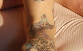 Foot Factory Lynn Pops 421891 NEW 04-28-2014 Lynn Has Lots Of Tattoos. She Poses In A Bikini
