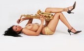 Thai Chix 423623 Janice In Panties Playing The Saxophone Topless
