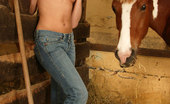 Sexy Olympics 424003 Horny Tyra In The Horse Shed Pushes A Dildo Into Her Pussy 
