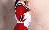 Sexy Olympics 424004 Sporting Girl With Great Tits Poses In Cheerleader Uniform 
