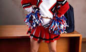 Sexy Olympics 424004 Sporting Girl With Great Tits Poses In Cheerleader Uniform 
