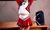 Sexy Olympics 424004 Sporting Girl With Great Tits Poses In Cheerleader Uniform 
