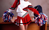 Sexy Olympics 424004 Sporting Girl With Great Tits Poses In Cheerleader Uniform 
