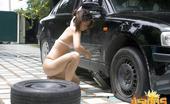Erotic Asians 425599 Pig-Tailed Asian Cutie Asako Changing Tires In Her Sexy Lingeria
