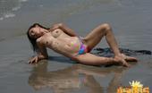 Erotic Asians 425662 Erotic Asian Nari Stripping Lascivious Her Swimsuit On The Beach

