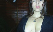 Dirty Wives Exposed 426112 Busty Housewife Cups Her Breasts
