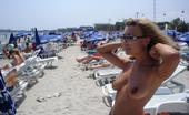 Dirty Wives Exposed Hot Naughty MILF Goes Topless In A Beach
