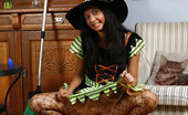Cuties In Tights 427115 Young Witch Dildoes Herself Through Fishnet Tights
