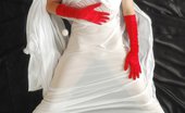 Skokoff 427756 Julietta Hot Sexy Brunette Teen In Red Gloves On The Black Sheets
