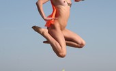 Skokoff 427994 Cezaria Small Breasted Gorgeous Blonde With Perky Nipples Jumping Naked On The Beach
