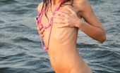 Skokoff 428071 Nivetta Brunette Teen Getting Wet In The Sea
