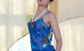 Skokoff 428150 Tata Tata Poses Elegantly And Naked Upon A Mirrored Surface

