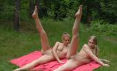 Special Exercises 431996 Coach Trains Two Naked Gymnasts In Forest
