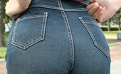 Jeans And Panties 438247 Jeans And Panties Naughty Brunette Flashes Her Ass In Public, Revealing Red Satin Panties
