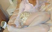 Nylon Passion 443010 Angelic Babe Blonde Slut In White Pantyhose And A Short Skirt

